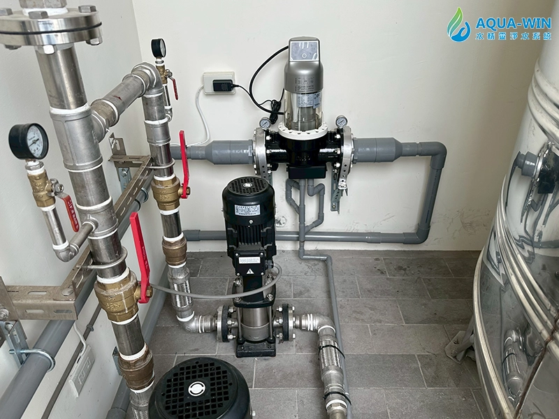 Whole-house automatic backwash pre-filtration system installed after the water storage tank to protect building pipelines
